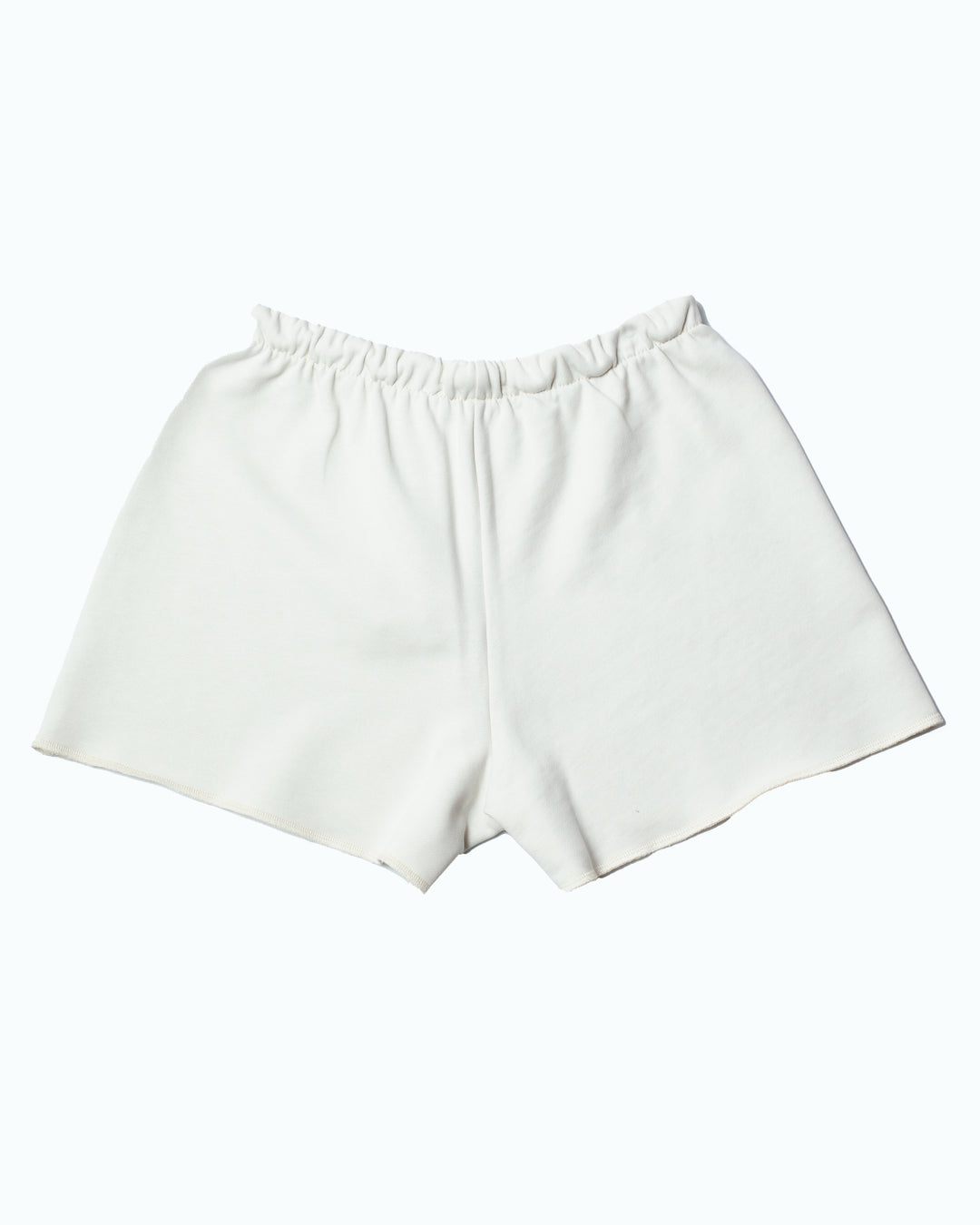 Flared off white short seen from the back.