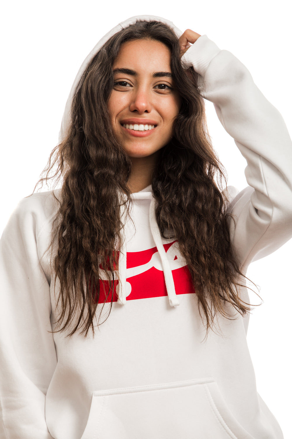 Young adult female wearing white Hoodie with Hobb written in Arabic حب in white and printed in a red velvet frame in the center of the Hoodie.